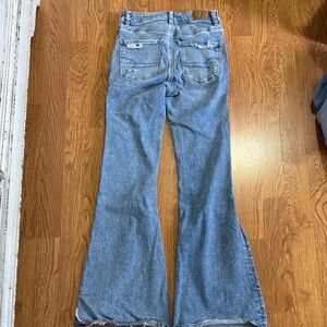 Women's Light Blue Flare Jeans with Distressed Back Pockets